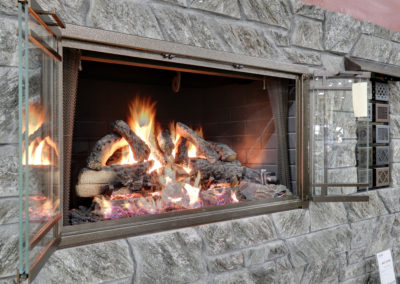 Fireplace Wall-Gas Logs Burning